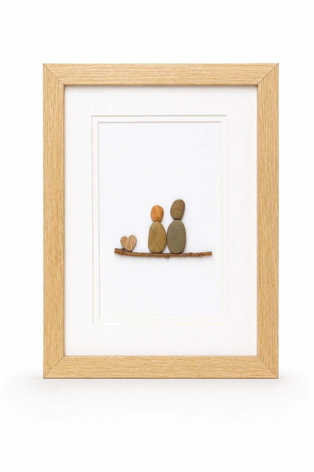 Minimalist pebble family portrait with wooden heart details